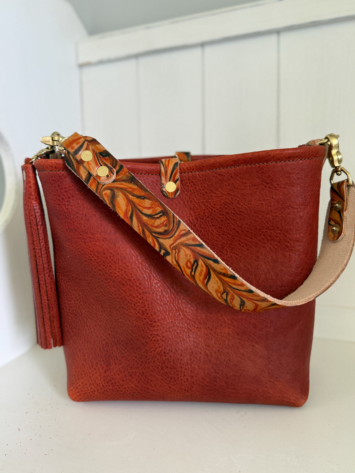 Hobo Bucket in Brick Full Grain Bison w/Candy Strap