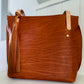 East West Tote in Tawny Full Grain Leather with foot/base