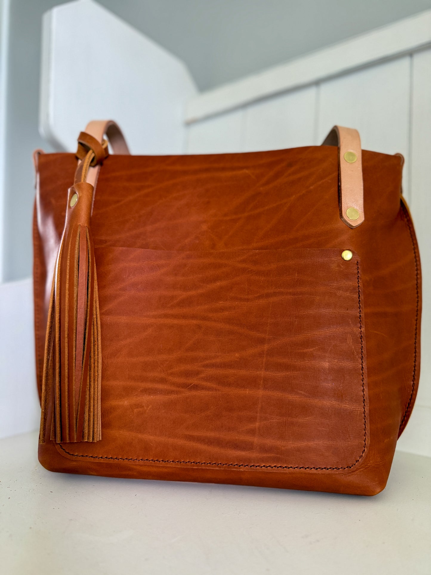 East West Tote in Tawny Full Grain Leather with foot/base