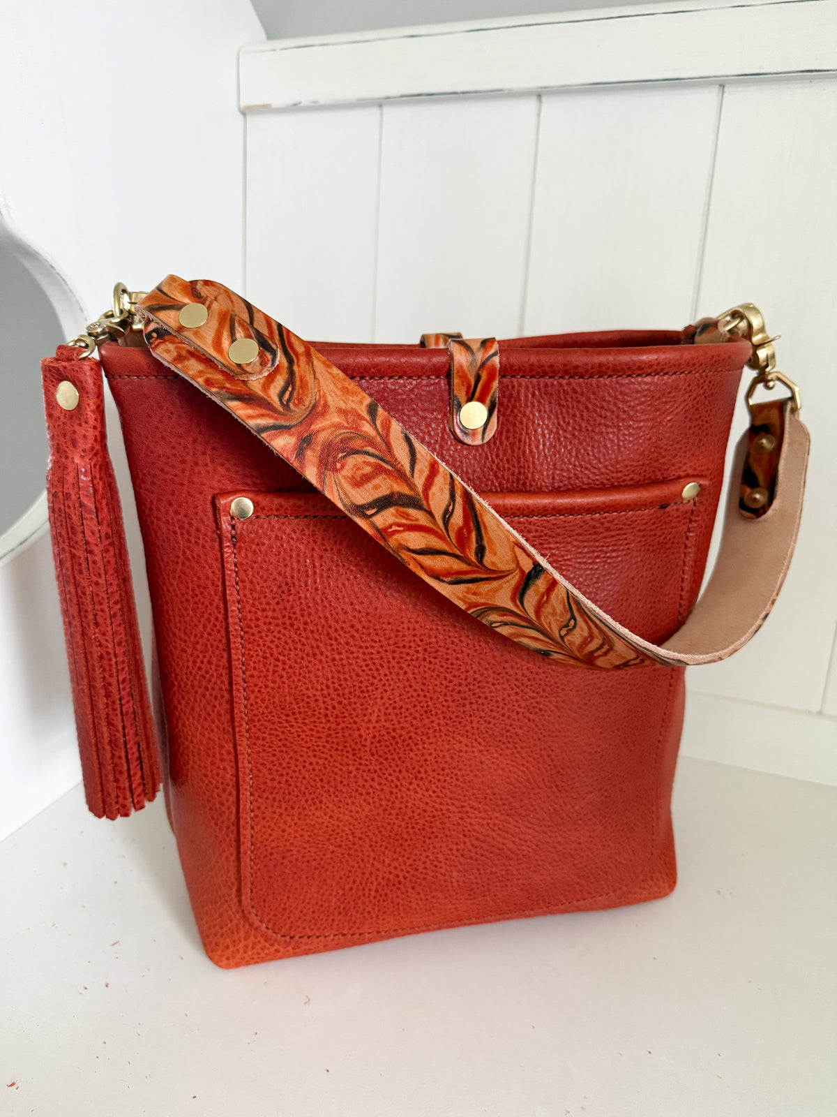 Bennett Bucket in Brick Bison Full Grain Leather w/Candy Strap