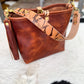 Hobo Bucket in Horween Brown Nut Dublin w/Candy Strap