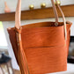East West Tote in Tawny Full Grain Leather with foot/base