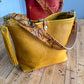 Hobo Bucket in Goldenrod Full Grain Bison w/Candy Strap