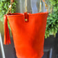 O Ring Bucket Bag in Mandarin Vachetta