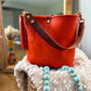 Hobo Bucket in Mandarin Vachetta