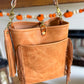 Western Bennett Bucket in Horween Natural Derby w/fringe and Candy Strap