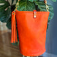 O Ring Bucket Bag in Mandarin Vachetta