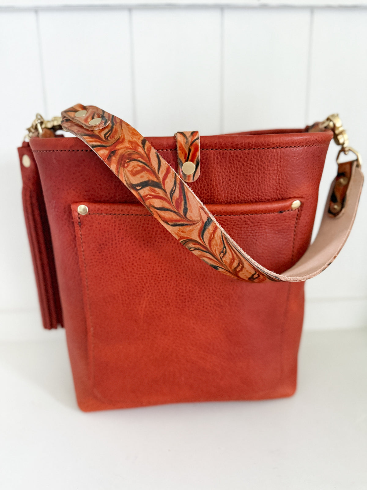 Bennett Bucket in Brick Bison Full Grain Leather w/Candy Strap