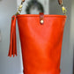 O Ring Bucket Bag in Mandarin Vachetta