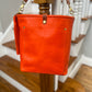 Bennett Bucket in Mandarin Vachetta