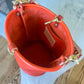 O Ring Bucket Bag in Mandarin Vachetta