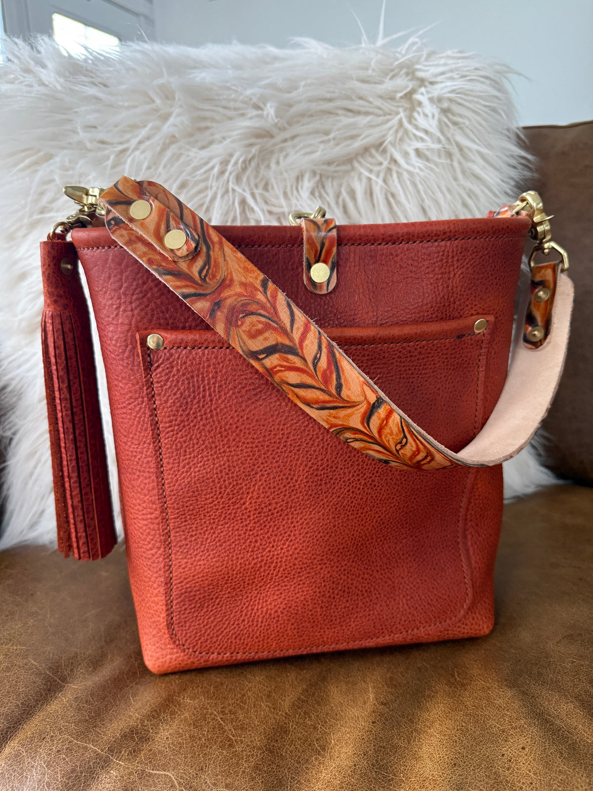 Bennett Bucket in Brick Bison Full Grain Leather w/Candy Strap