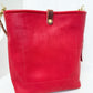 Bennett Bucket in Ruby Vachetta
