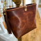 Hobo Bucket in Horween Brown Nut Dublin w/Candy Strap