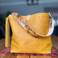 Hobo Bucket in Goldenrod Full Grain Bison w/Candy Strap