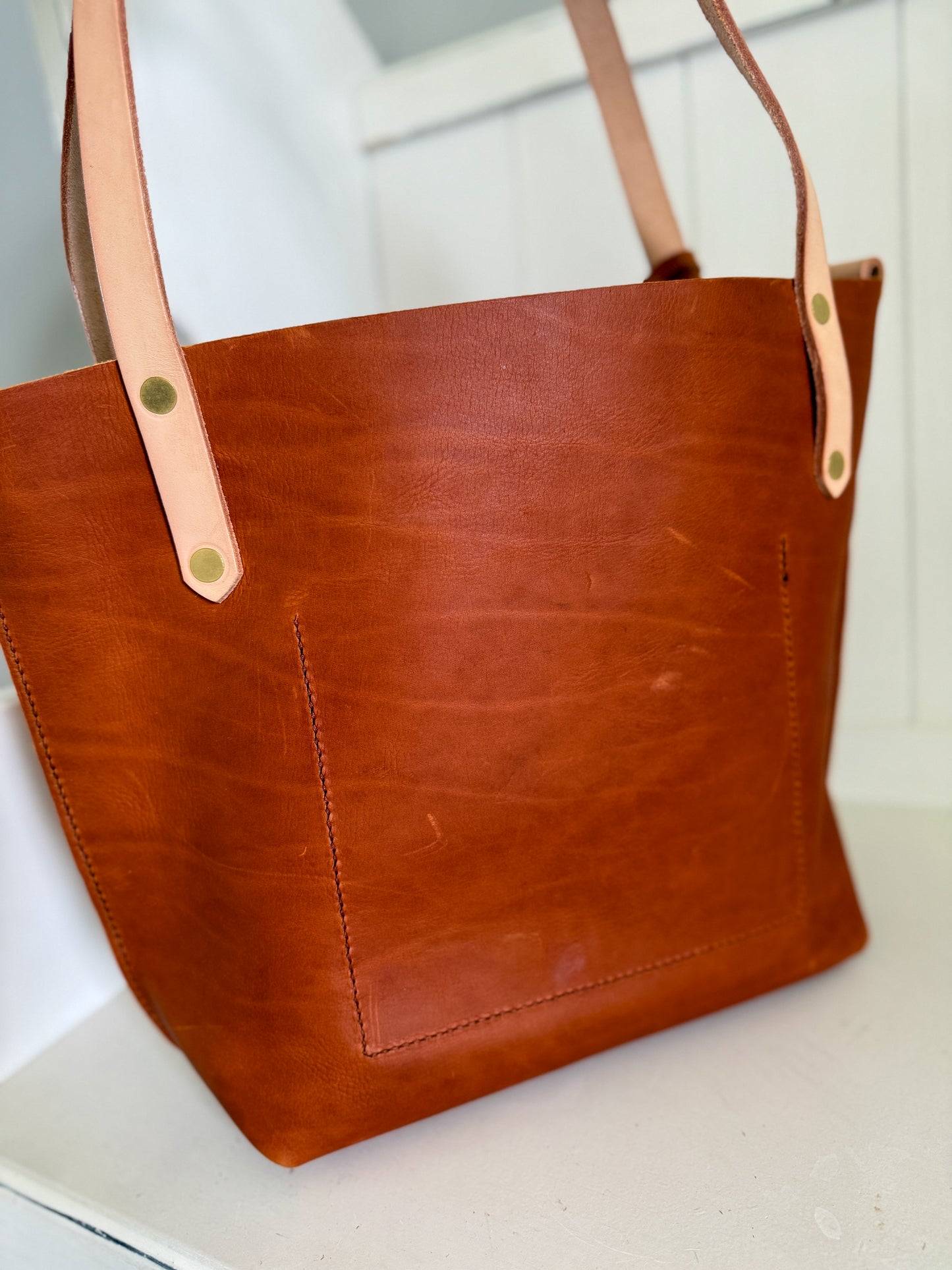 East West Tote in Tawny Full Grain Leather with foot/base