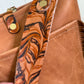 Western Bennett Bucket in Horween Natural Derby w/fringe and Candy Strap