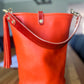 O Ring Bucket Bag in Mandarin Vachetta