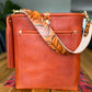 Bennett Bucket in Brick Bison Full Grain Leather w/Candy Strap