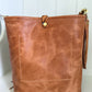 Western Bennett Bucket in Horween Natural Derby w/fringe and Candy Strap