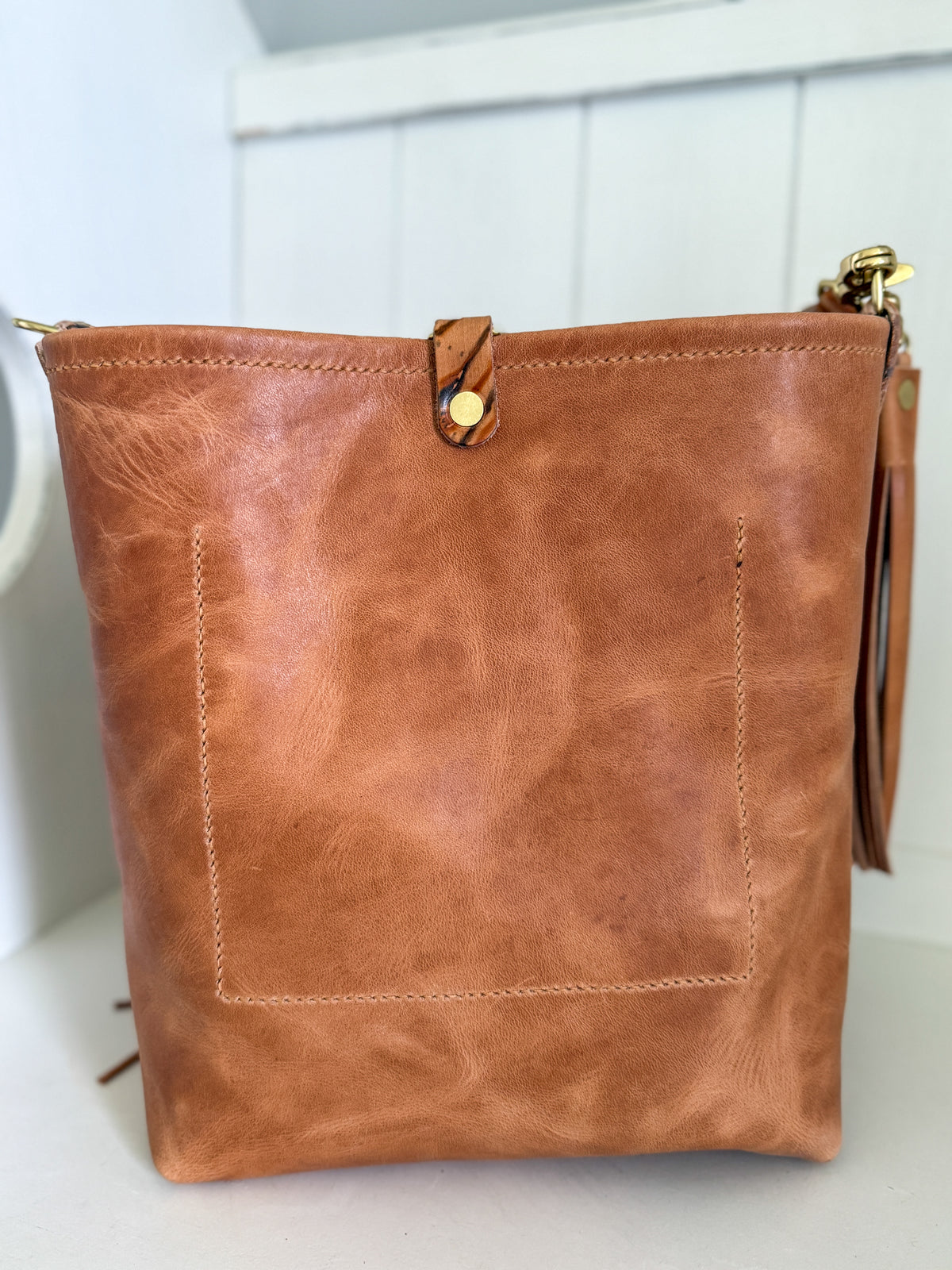 Western Bennett Bucket in Horween Natural Derby w/fringe and Candy Strap