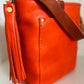 Bennett Bucket in Mandarin Vachetta