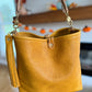 Hobo Bucket in Goldenrod Full Grain Bison w/Candy Strap