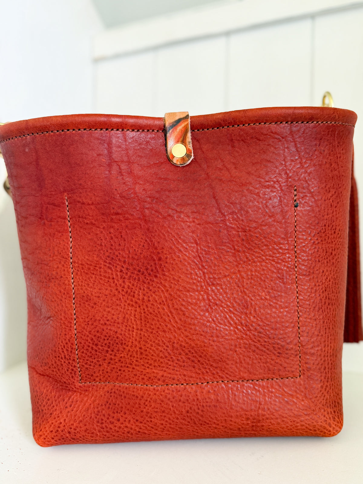 Hobo Bucket in Brick Full Grain Bison w/Candy Strap