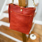 Bennett Bucket in Brick Bison Full Grain Leather w/Candy Strap