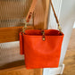 Hobo Bucket in Mandarin Vachetta