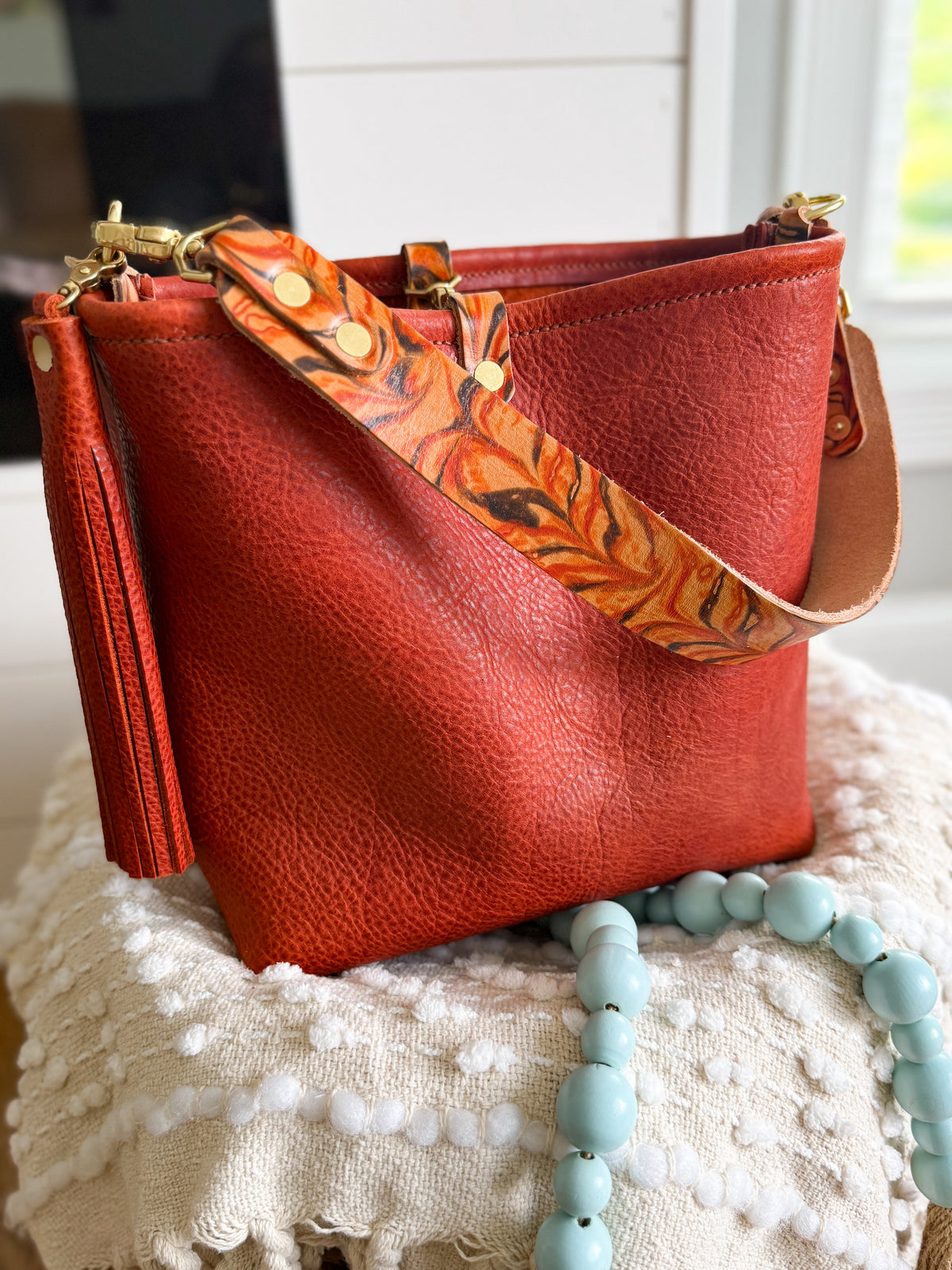 Hobo Bucket in Brick Full Grain Bison w/Candy Strap