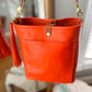 Bennett Bucket in Mandarin Vachetta
