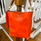 Bennett Bucket in Mandarin Vachetta