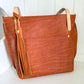 East West Tote in Tawny Full Grain Leather with foot/base