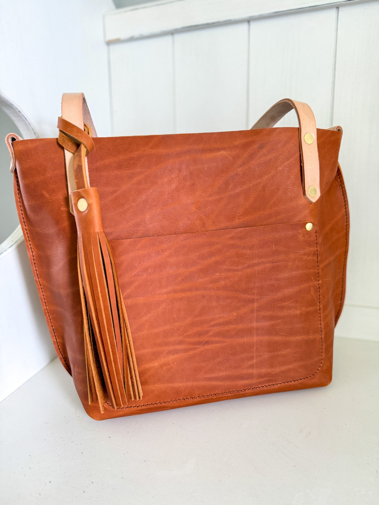 East West Tote in Tawny Full Grain Leather with foot/base