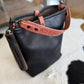 Slim Hobo Bucket in Horween Jet Black Full Grain Leather w/Hermann Oak Strap