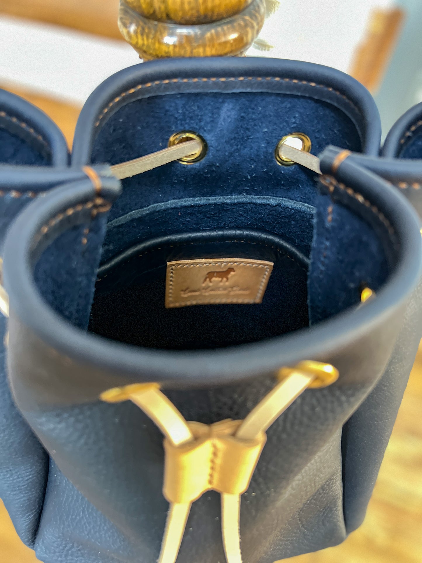 Emery Drawstring Bucket in Navy Kodiak